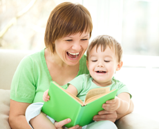 stock-photo-mother-is-reading-book-for-her-son-indoor-shoot-119085061